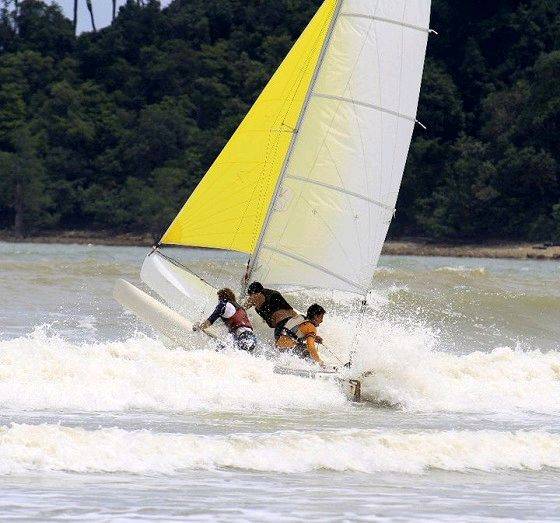 Punching the trimaran through the surf