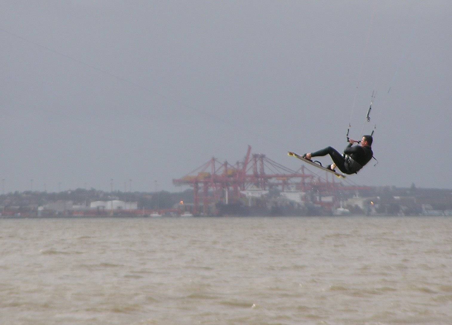 Ian - jumping the container terminal over a muddy bay