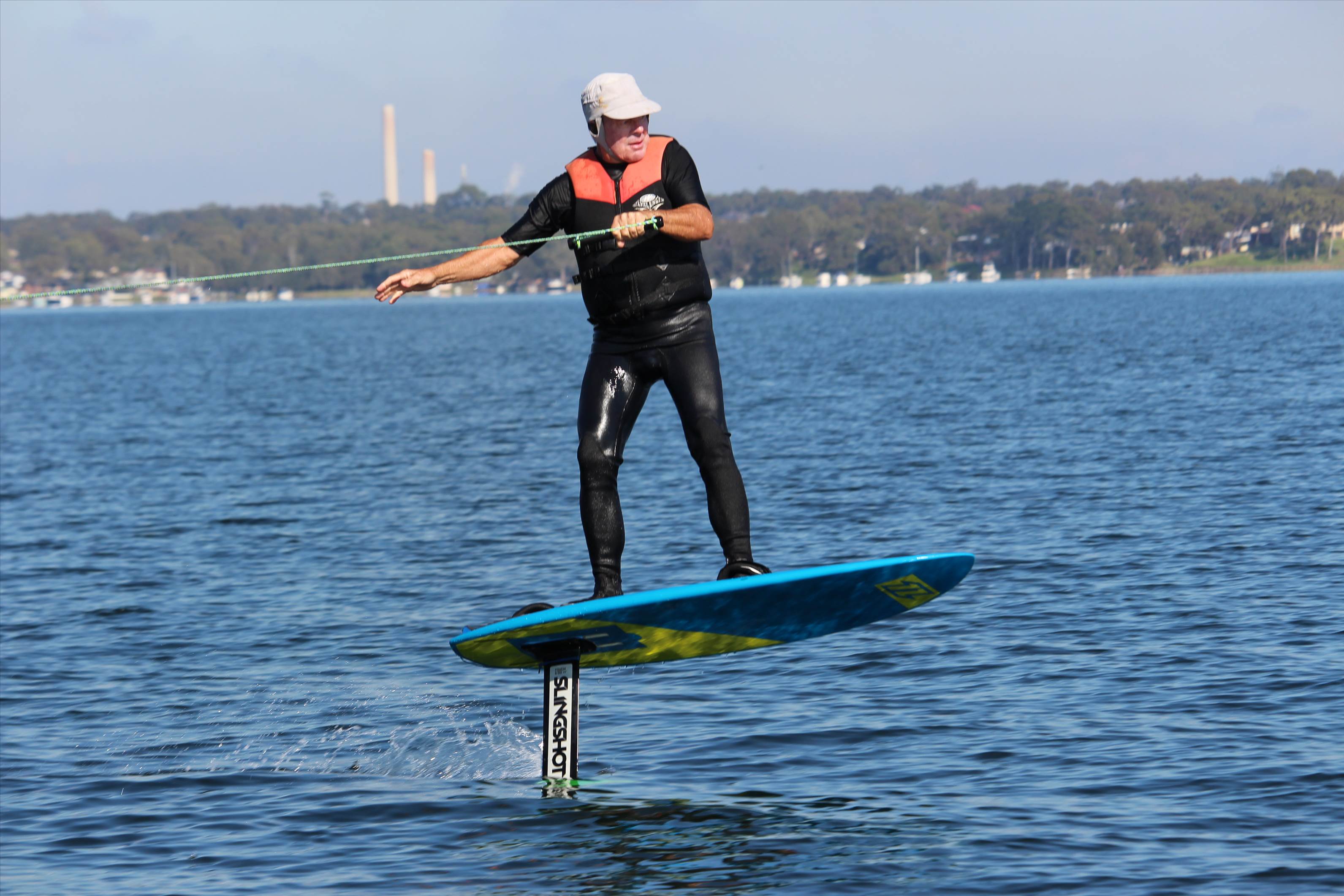 Boat foiling with kite board