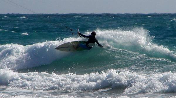 brad in the waves mate unhooked unstrapped ho it should be 