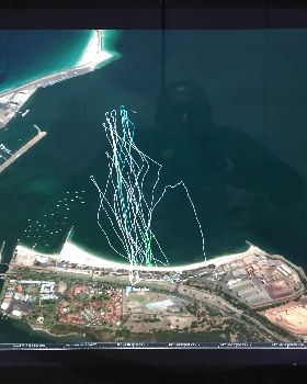 Windsurfing foiler rescue Kite foiler from shipping channel