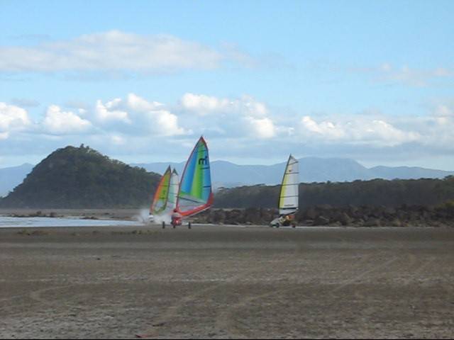Exploring Midge Point- raceing the tide home!