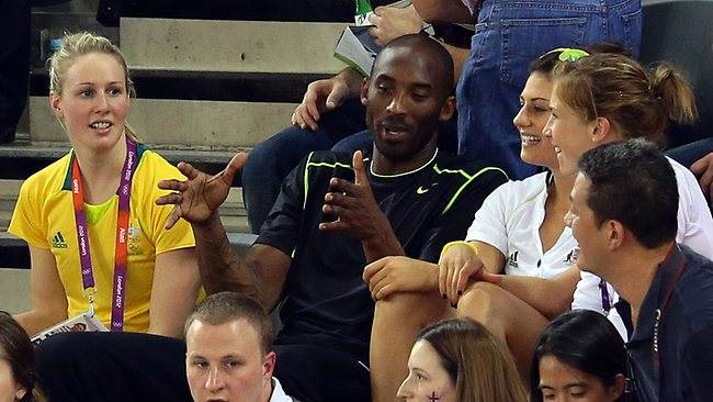 514275-kobe-bryant-chats-with-steph-rice