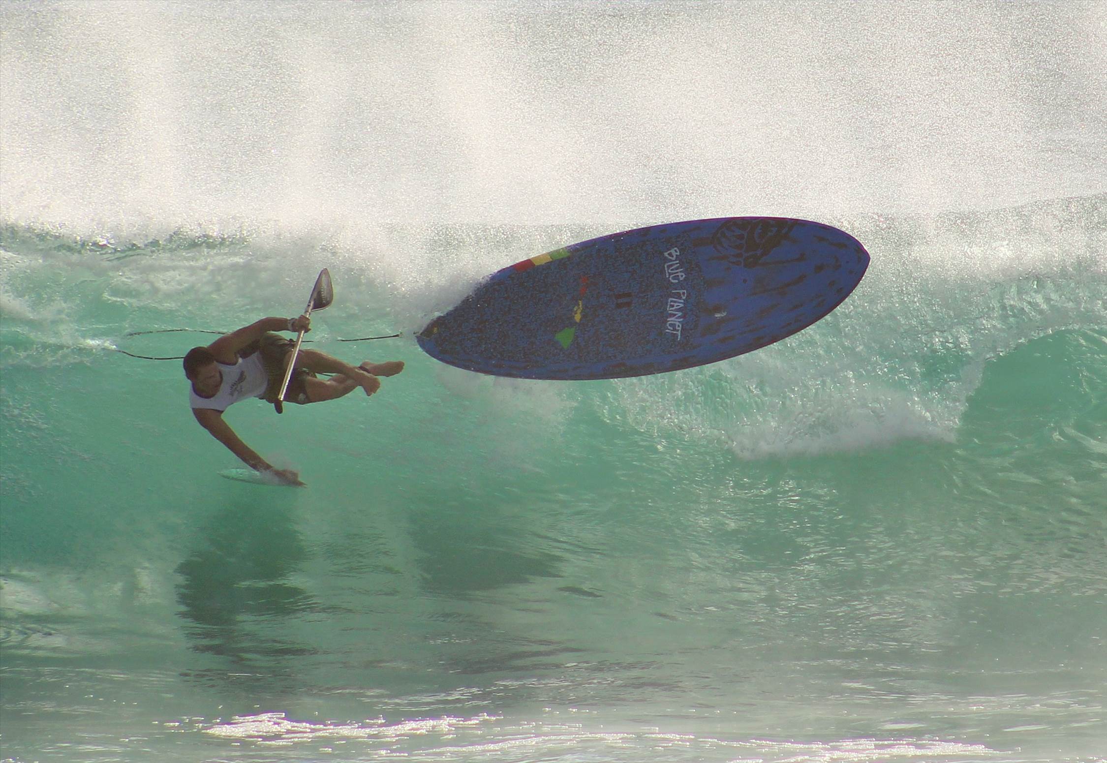 SUP surf wipeout