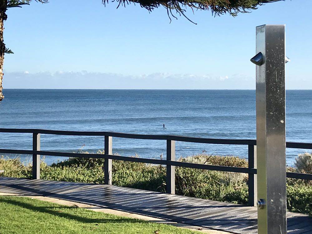 Lonely SUPer in perfect autumn conditions