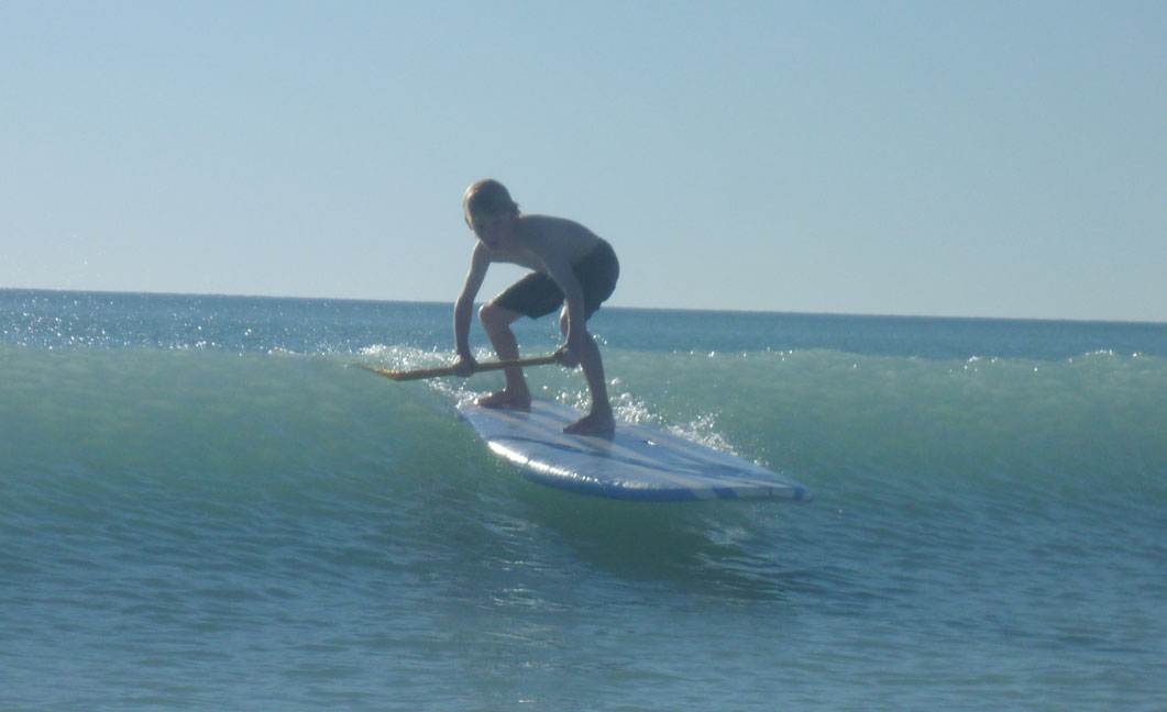 robbie surfing