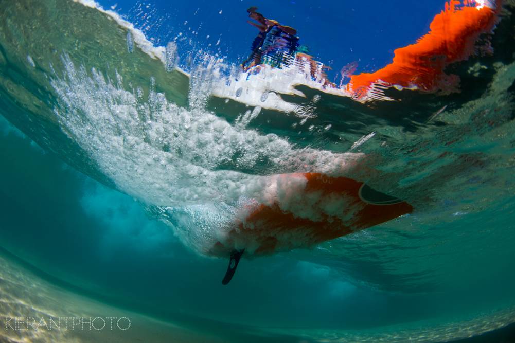 PAUL underneath board wave
