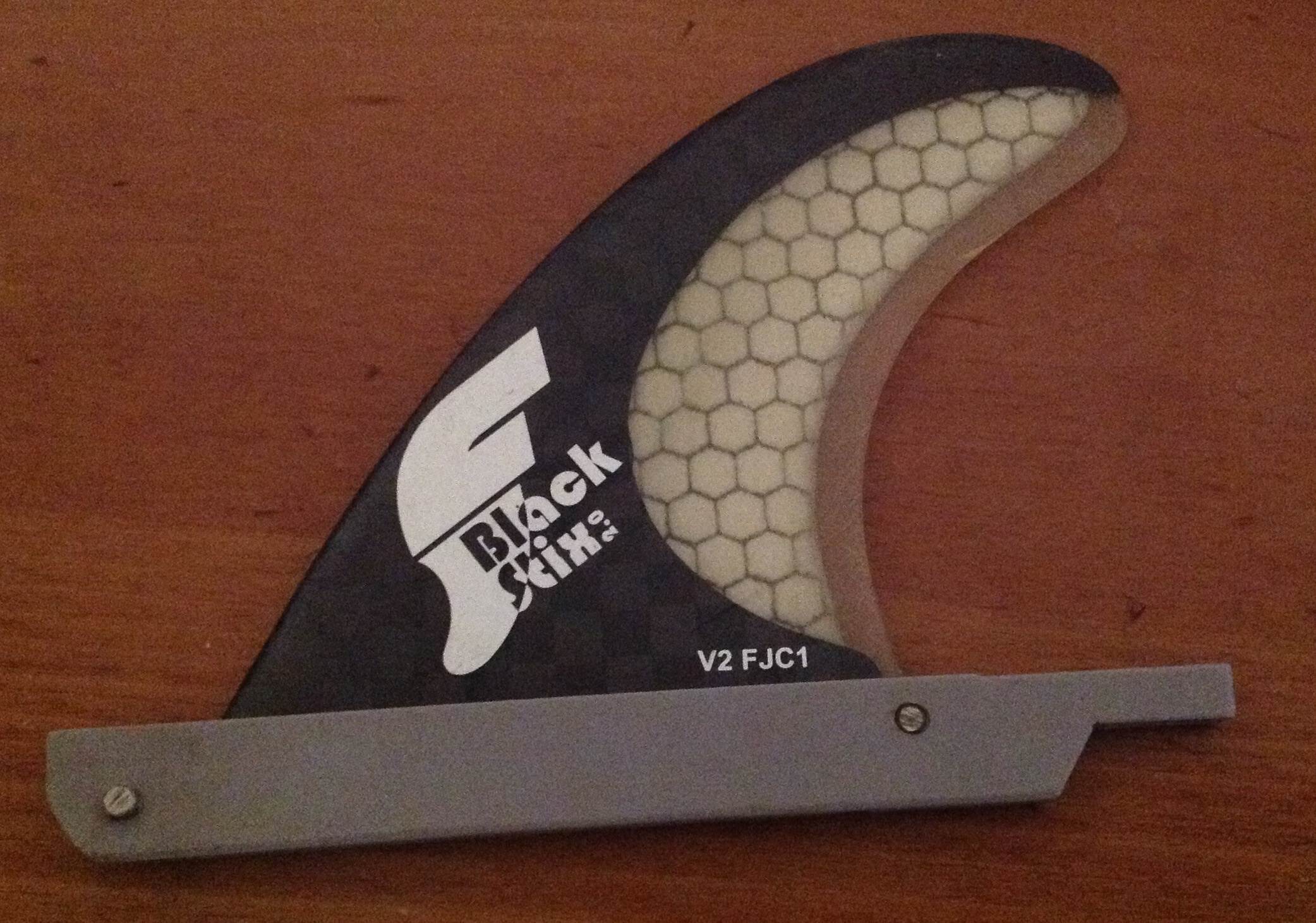 Futures Fin-box that sits inside a single fin box.