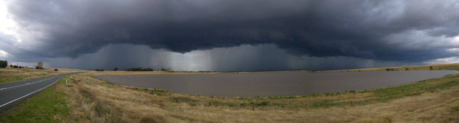 storm front over grassy lake: Donald, Vic