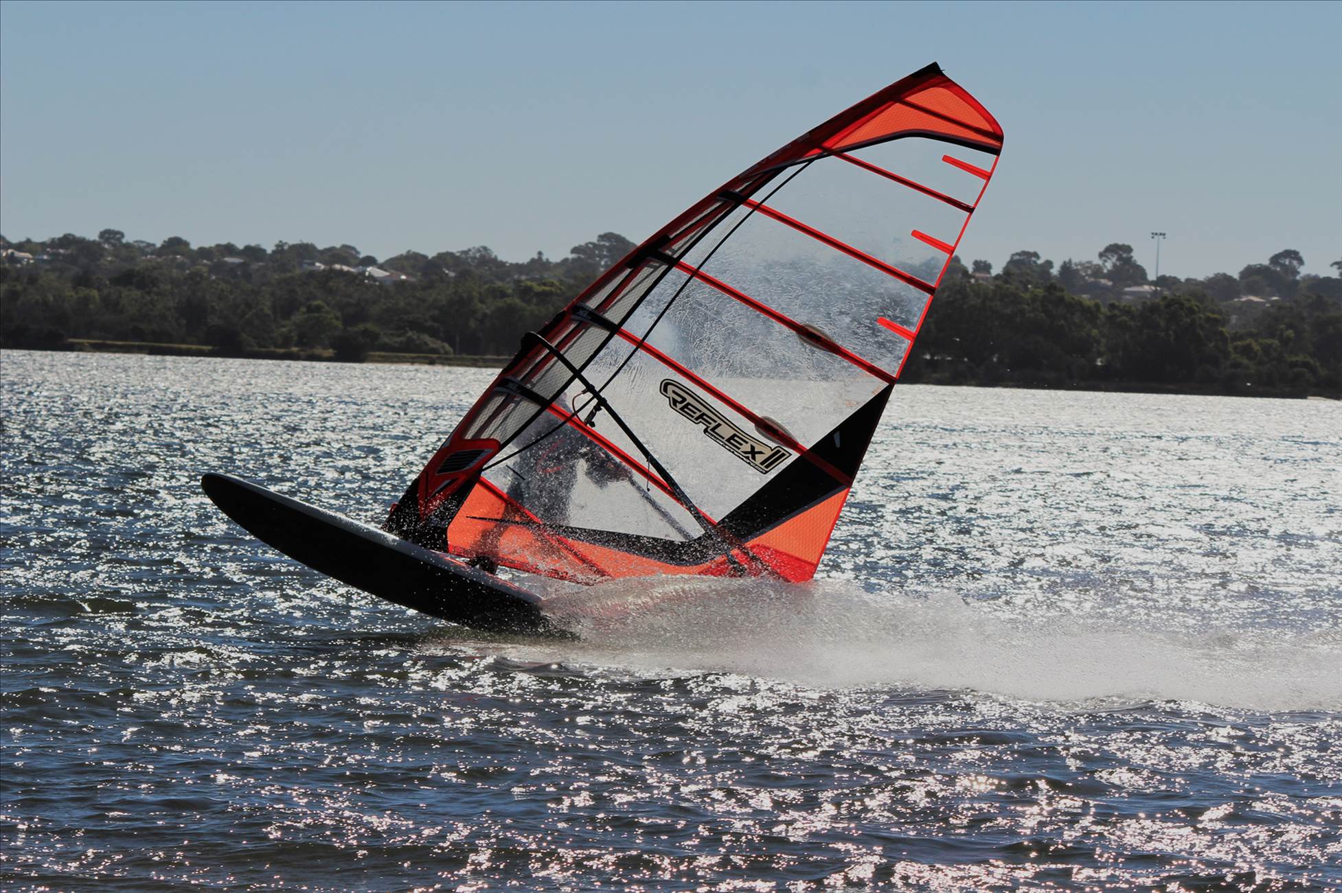 kid windsurfing