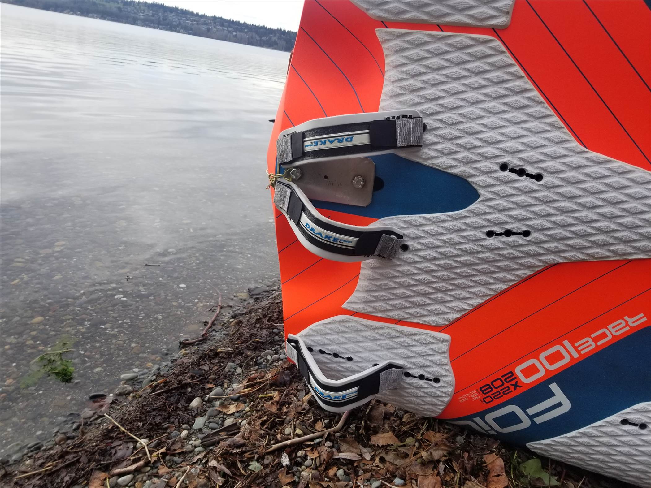 Starboard Race 100 with custom top deck foil mast plate