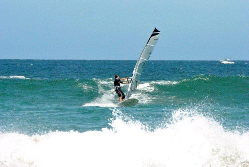 Getting some good waves and getting smashed on my SUP