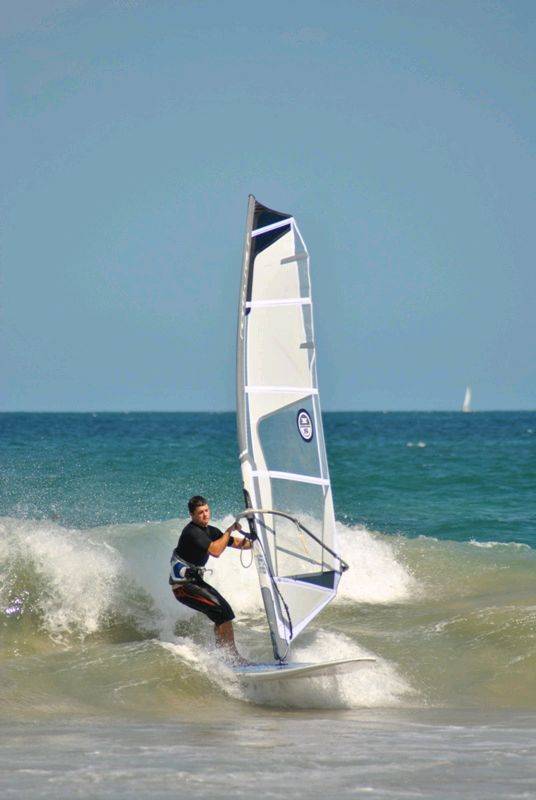 Getting some good waves and getting smashed on my SUP