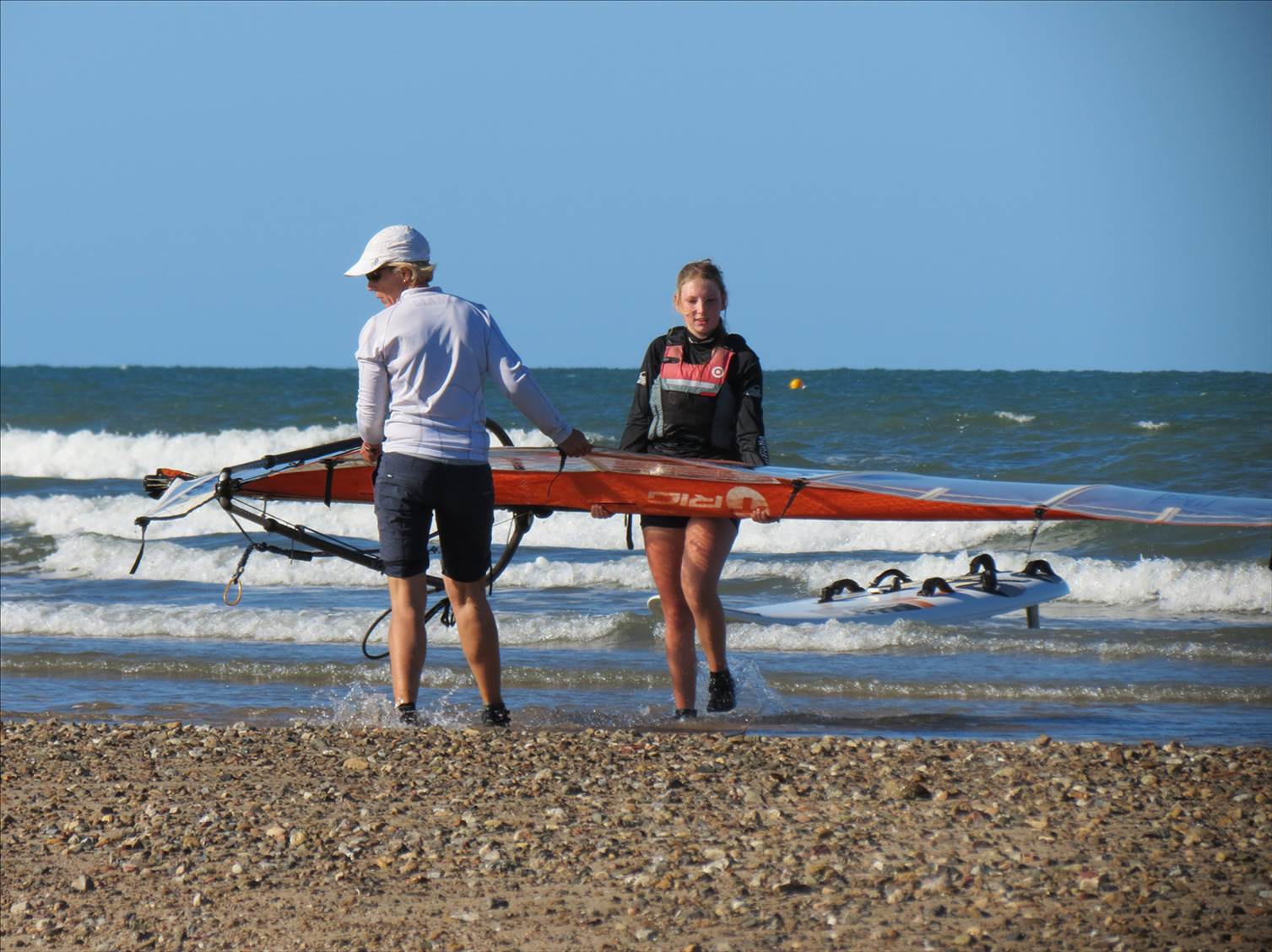 Some of the sailors coming in from a hard day on the water