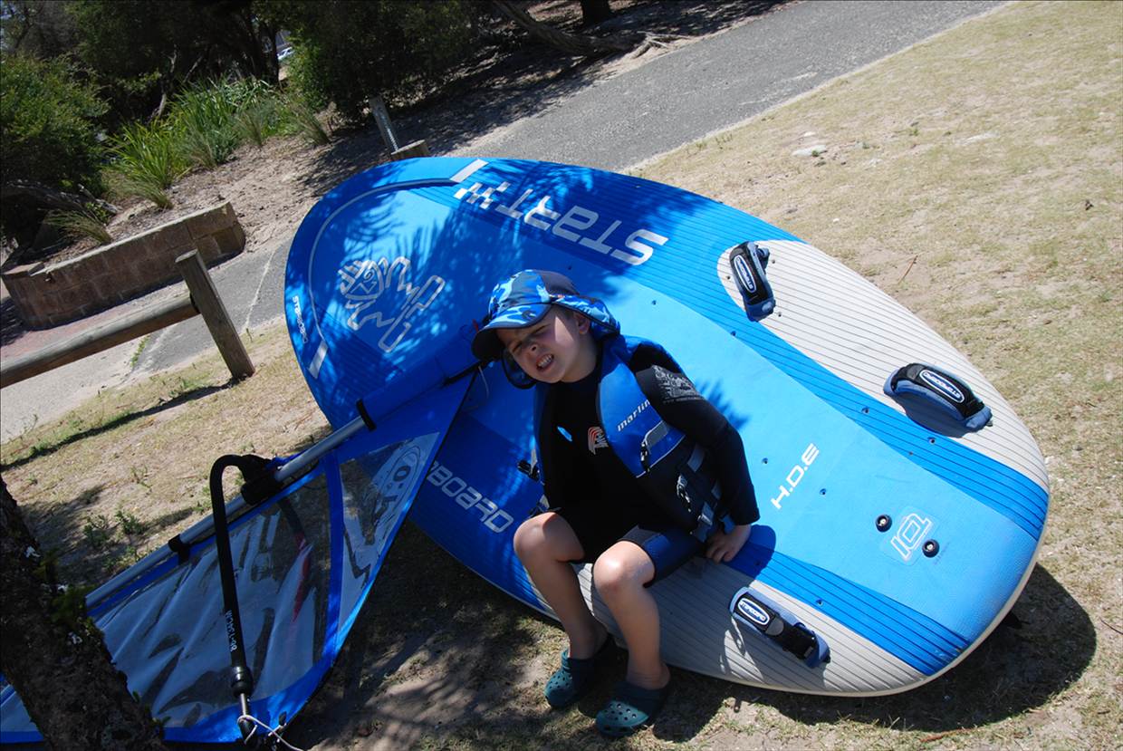 Big Board, Small Sail, Even Smaller Sailor